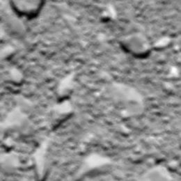 Rosettas letztes Bild des Kometen 67P/Tschurjumow-Gerassimenko, aufgenommen von der OSIRIS Weitwinkelkamera kurz vor dem Aufsetzen der Sonde aus etwa 20 m Höhe über Grund.
(Bild: ESA/Rosetta/MPS for OSIRIS Team MPS/UPD/LAM/IAA/SSO/INTA/UPM/DASP/IDA)